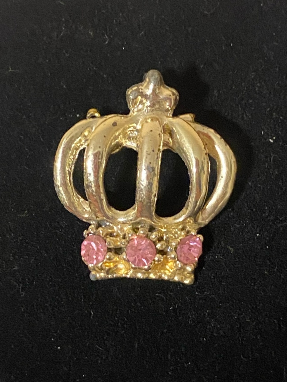 crown shaped brooch with pink rhinestones